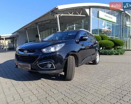 Чорний Хендай іх35, об'ємом двигуна 2 л та пробігом 237 тис. км за 12950 $, фото 7 на Automoto.ua