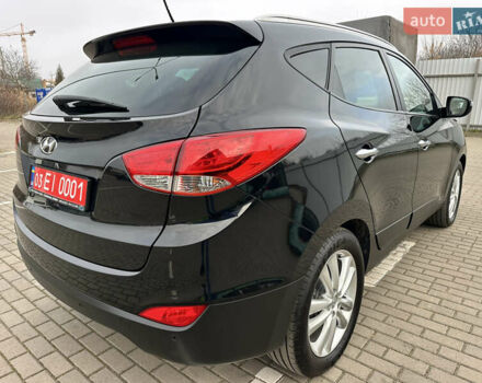 Чорний Хендай іх35, об'ємом двигуна 2 л та пробігом 148 тис. км за 14599 $, фото 16 на Automoto.ua