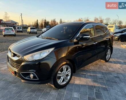 Черный Хендай их35, объемом двигателя 2 л и пробегом 178 тыс. км за 12699 $, фото 4 на Automoto.ua