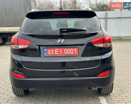 Чорний Хендай іх35, об'ємом двигуна 2 л та пробігом 148 тис. км за 14599 $, фото 5 на Automoto.ua