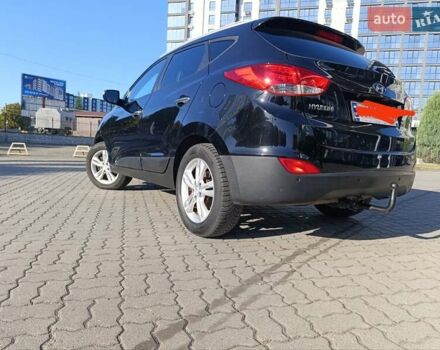 Чорний Хендай іх35, об'ємом двигуна 2 л та пробігом 237 тис. км за 12950 $, фото 21 на Automoto.ua