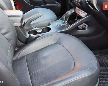 Чорний Хендай іх35, об'ємом двигуна 2 л та пробігом 203 тис. км за 13750 $, фото 26 на Automoto.ua