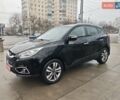 Чорний Хендай іх35, об'ємом двигуна 2 л та пробігом 203 тис. км за 13850 $, фото 5 на Automoto.ua