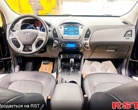 Чорний Хендай іх35, об'ємом двигуна 2 л та пробігом 203 тис. км за 13500 $, фото 5 на Automoto.ua