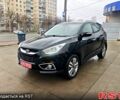 Чорний Хендай іх35, об'ємом двигуна 2 л та пробігом 203 тис. км за 13500 $, фото 1 на Automoto.ua