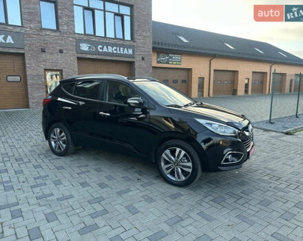 Чорний Хендай іх35, об'ємом двигуна 2 л та пробігом 230 тис. км за 13400 $, фото 1 на Automoto.ua