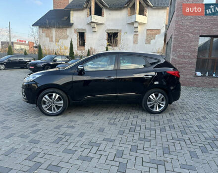 Чорний Хендай іх35, об'ємом двигуна 2 л та пробігом 230 тис. км за 13400 $, фото 3 на Automoto.ua