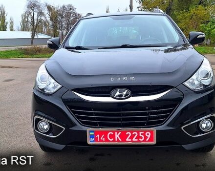 Чорний Хендай іх35, об'ємом двигуна 2 л та пробігом 169 тис. км за 14300 $, фото 1 на Automoto.ua