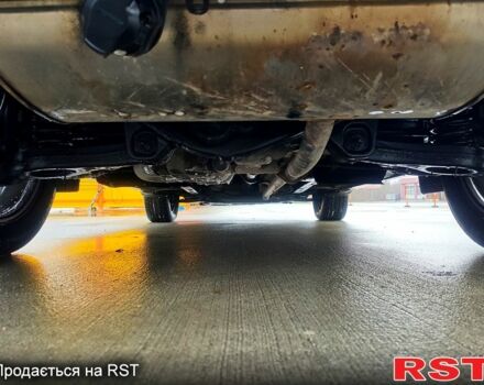 Чорний Хендай іх35, об'ємом двигуна 2 л та пробігом 203 тис. км за 13500 $, фото 12 на Automoto.ua