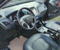Чорний Хендай іх35, об'ємом двигуна 2 л та пробігом 203 тис. км за 13750 $, фото 13 на Automoto.ua