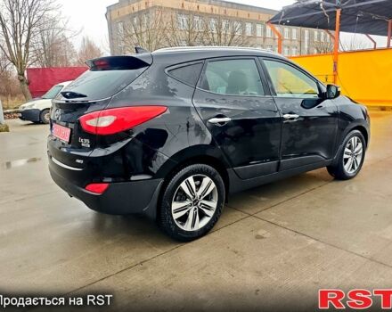 Чорний Хендай іх35, об'ємом двигуна 2 л та пробігом 203 тис. км за 13500 $, фото 7 на Automoto.ua