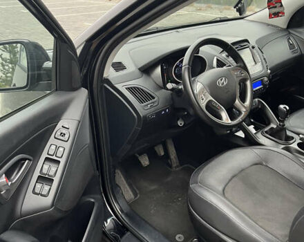 Черный Хендай их35, объемом двигателя 1.69 л и пробегом 167 тыс. км за 13200 $, фото 7 на Automoto.ua