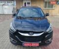 Чорний Хендай іх35, об'ємом двигуна 2 л та пробігом 193 тис. км за 14250 $, фото 8 на Automoto.ua