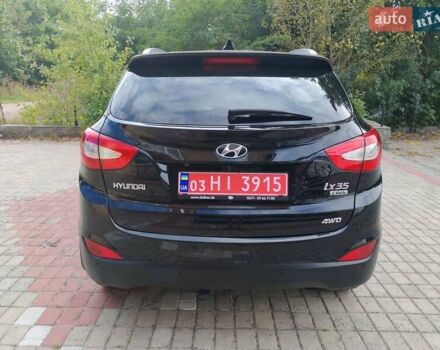 Чорний Хендай іх35, об'ємом двигуна 2 л та пробігом 193 тис. км за 14250 $, фото 10 на Automoto.ua