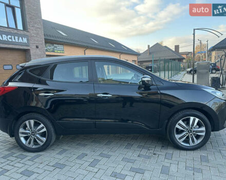 Чорний Хендай іх35, об'ємом двигуна 2 л та пробігом 230 тис. км за 13400 $, фото 5 на Automoto.ua