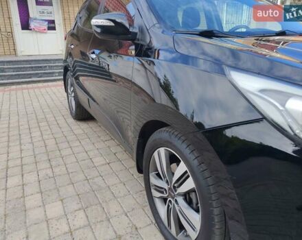 Чорний Хендай іх35, об'ємом двигуна 2 л та пробігом 193 тис. км за 14250 $, фото 5 на Automoto.ua