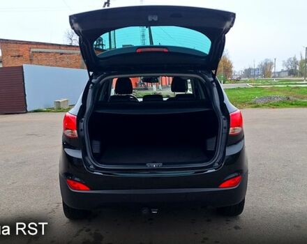 Чорний Хендай іх35, об'ємом двигуна 2 л та пробігом 169 тис. км за 14300 $, фото 11 на Automoto.ua