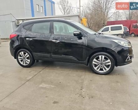 Чорний Хендай іх35, об'ємом двигуна 2 л та пробігом 203 тис. км за 13850 $, фото 3 на Automoto.ua