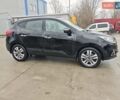 Чорний Хендай іх35, об'ємом двигуна 2 л та пробігом 203 тис. км за 13850 $, фото 3 на Automoto.ua