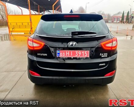 Чорний Хендай іх35, об'ємом двигуна 2 л та пробігом 203 тис. км за 13500 $, фото 9 на Automoto.ua