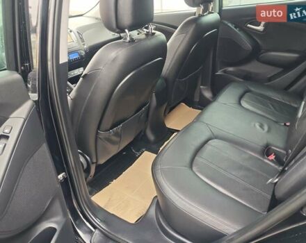 Чорний Хендай іх35, об'ємом двигуна 2 л та пробігом 203 тис. км за 13850 $, фото 19 на Automoto.ua