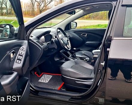 Чорний Хендай іх35, об'ємом двигуна 2 л та пробігом 169 тис. км за 14300 $, фото 7 на Automoto.ua