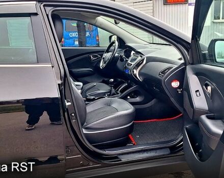 Чорний Хендай іх35, об'ємом двигуна 2 л та пробігом 169 тис. км за 14300 $, фото 9 на Automoto.ua