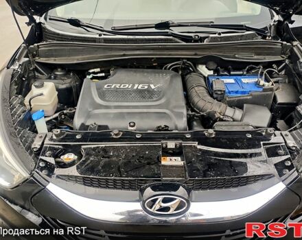 Чорний Хендай іх35, об'ємом двигуна 2 л та пробігом 203 тис. км за 13500 $, фото 3 на Automoto.ua