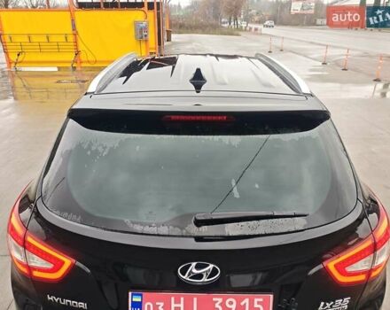 Чорний Хендай іх35, об'ємом двигуна 2 л та пробігом 203 тис. км за 13850 $, фото 13 на Automoto.ua