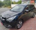 Чорний Хендай іх35, об'ємом двигуна 2 л та пробігом 193 тис. км за 14250 $, фото 6 на Automoto.ua