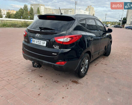 Черный Хендай их35, объемом двигателя 2 л и пробегом 246 тыс. км за 15300 $, фото 4 на Automoto.ua