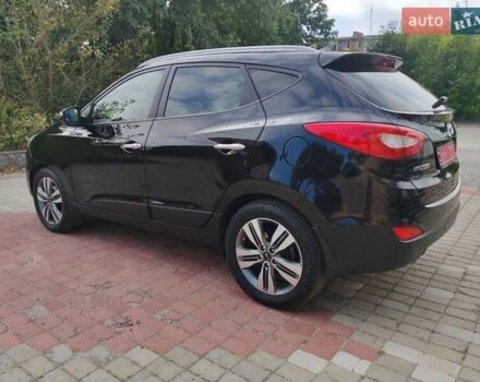Чорний Хендай іх35, об'ємом двигуна 2 л та пробігом 193 тис. км за 14250 $, фото 4 на Automoto.ua