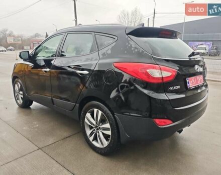 Чорний Хендай іх35, об'ємом двигуна 2 л та пробігом 203 тис. км за 13850 $, фото 11 на Automoto.ua
