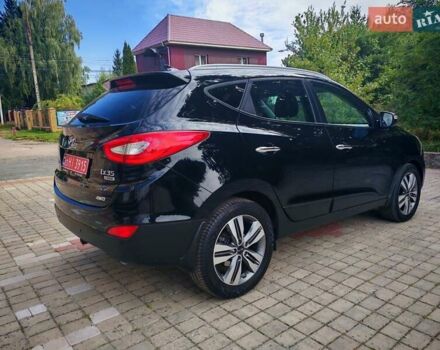 Чорний Хендай іх35, об'ємом двигуна 2 л та пробігом 193 тис. км за 14250 $, фото 27 на Automoto.ua