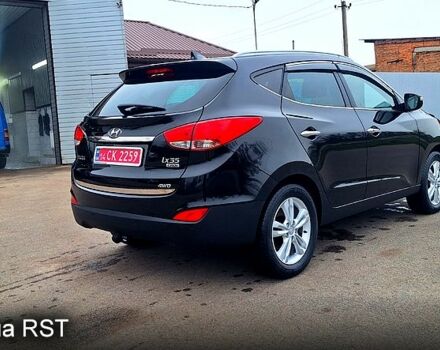 Чорний Хендай іх35, об'ємом двигуна 2 л та пробігом 169 тис. км за 14300 $, фото 5 на Automoto.ua