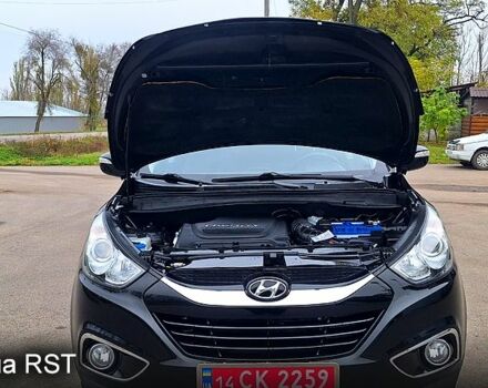 Чорний Хендай іх35, об'ємом двигуна 2 л та пробігом 169 тис. км за 14300 $, фото 13 на Automoto.ua