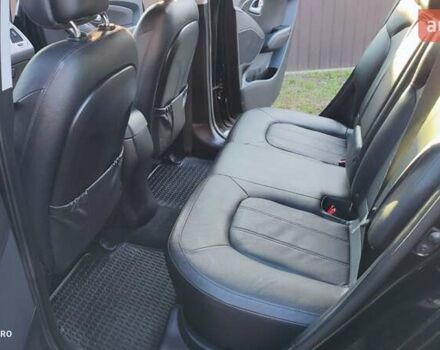 Чорний Хендай іх35, об'ємом двигуна 2 л та пробігом 203 тис. км за 13750 $, фото 3 на Automoto.ua