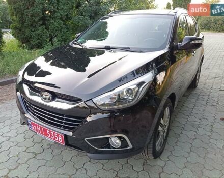 Чорний Хендай іх35, об'ємом двигуна 2 л та пробігом 206 тис. км за 15650 $, фото 4 на Automoto.ua