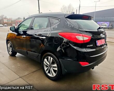 Чорний Хендай іх35, об'ємом двигуна 2 л та пробігом 203 тис. км за 13500 $, фото 6 на Automoto.ua