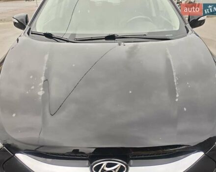 Чорний Хендай іх35, об'ємом двигуна 2 л та пробігом 203 тис. км за 13850 $, фото 1 на Automoto.ua