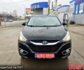 Чорний Хендай іх35, об'ємом двигуна 2 л та пробігом 203 тис. км за 13500 $, фото 8 на Automoto.ua
