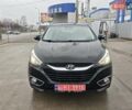 Чорний Хендай іх35, об'ємом двигуна 2 л та пробігом 203 тис. км за 13850 $, фото 6 на Automoto.ua