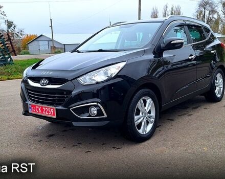 Чорний Хендай іх35, об'ємом двигуна 2 л та пробігом 169 тис. км за 14300 $, фото 2 на Automoto.ua