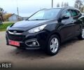 Чорний Хендай іх35, об'ємом двигуна 2 л та пробігом 169 тис. км за 14300 $, фото 2 на Automoto.ua