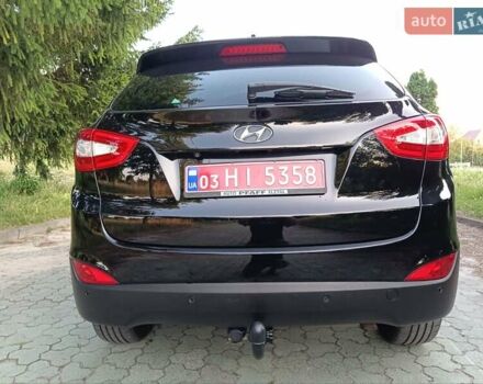 Чорний Хендай іх35, об'ємом двигуна 2 л та пробігом 206 тис. км за 15650 $, фото 21 на Automoto.ua