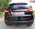 Чорний Хендай іх35, об'ємом двигуна 2 л та пробігом 206 тис. км за 15650 $, фото 21 на Automoto.ua
