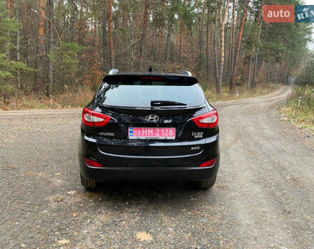 Чорний Хендай іх35, об'ємом двигуна 2 л та пробігом 160 тис. км за 15599 $, фото 22 на Automoto.ua