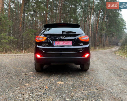 Чорний Хендай іх35, об'ємом двигуна 2 л та пробігом 160 тис. км за 15599 $, фото 13 на Automoto.ua