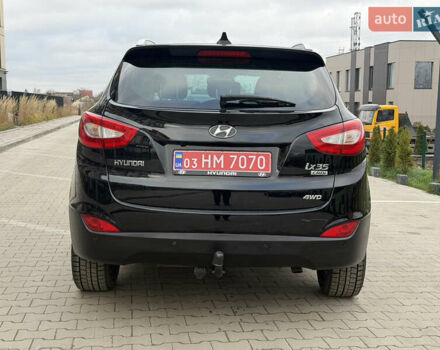 Чорний Хендай іх35, об'ємом двигуна 2 л та пробігом 240 тис. км за 15499 $, фото 4 на Automoto.ua