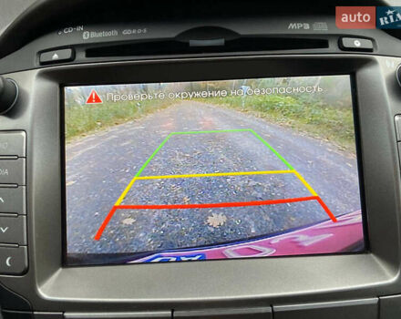 Чорний Хендай іх35, об'ємом двигуна 2 л та пробігом 160 тис. км за 15599 $, фото 66 на Automoto.ua